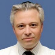 Эндрю Канер